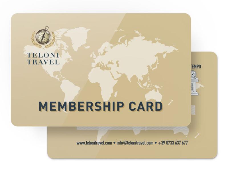 Golden travel card with world map, evokes adventure and discovery.